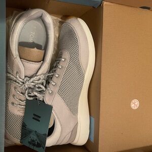 Brand new women’s size 10 Toms sneakers